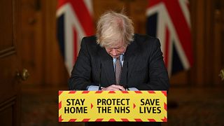Boris Johnson as Prime Minister at a COVID-19 news conference. A report found he had misled Parliament over parties during lockdown.