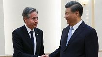 US Secretary of State Antony Blinken shakes hands with China's President Xi Jinping.