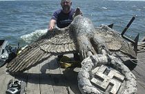 In this Feb. 10, 2006 file photo, workers salvage the eagle from the World War II German pocket battleship Admiral Graf Spee, in Montevideo, Uruguay.