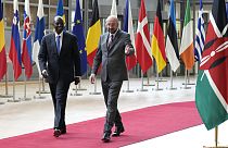 European Council President Charles Michel, right, speaks with Kenya's President William Ruto.