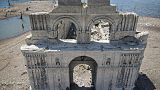 The Temple of Quechula church emerging from the Malpaso Dam after water levels dropped due to the drought. The Temple of Quechula church emerging from the Malpaso Dam after water levels dropped due to the drought.