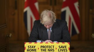 FILE - UK's then-PM Boris Johnson reacts while leading a virtual news conference on the COVID-19 pandemic, inside 10 Downing Street in London on Jan. 26, 2021