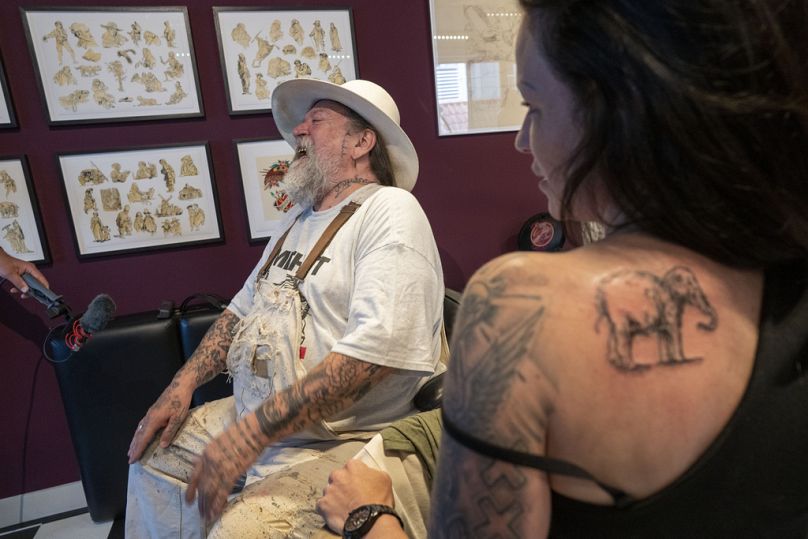 High art becomes body art as visitors to Amsterdam's Rembrandt House Museum  get inked | AP News