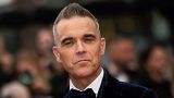 Robbie Williams poses for photographers upon arrival at the premiere of the film 'Killers of the Flower Moon' at the 76th international film festival, Cannes, southern France,