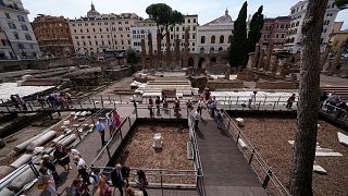 Journalists visit the 'Sacred Area' where four temples, dating back as far as the 3rd century B.C., stand smack in the middle of one of modern Rome's crossroads.