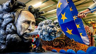 A carnival float with a figure depicting Russian President Vladimir Putin is presented during a press preview for the Mainz carnival in Mainz, Germany, Tuesday, Feb. 14, 2023.