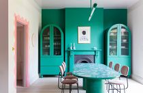 A riot of colour and contrasts - the dining room at Jordan Cluroe and Russell Whitehead's London home