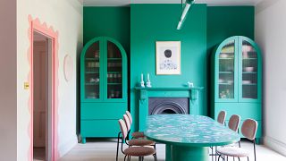 A riot of colour and contrasts - the dining room at Jordan Cluroe and Russell Whitehead's London home