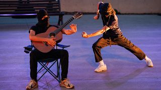 Dancers of the Hylel Company led by choregrapher Marina Gomes perform "Bach Nord (Sortez les guitares)" show on stage in Marseille, France, on June 19, 2023.