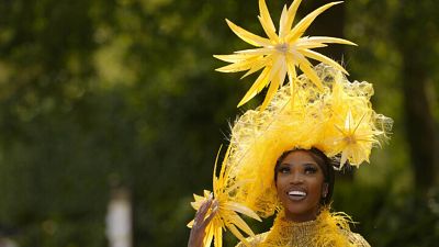 Going all out - a race-goer wears a vast headpiece at Royal Ascot