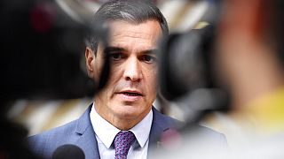 Spain's Prime Minister Pedro Sanchez speaks with the media at a EU summit in Brussels.