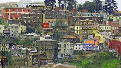 Houses are seen on Toro Hill in the Chilean port city of Valparaiso, Wednesday July 2, 2003.