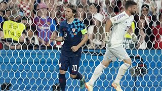 Croatia's Luka Modric reacts after scoring during a penalty shootout at the end of the Nations League final soccer match between Croatia and Spain in Rotterdam.