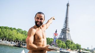 Catalin Preda holding his trophy after the Paris 2022 event.
