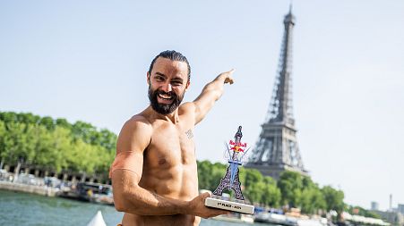 Catalin Preda holding his trophy after the Paris 2022 event. 