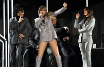 Taylor Swift, centre, performs during the opener of her Eras tour on Friday, 17 March 2023, at State Farm Stadium in Glendale, Arizona.