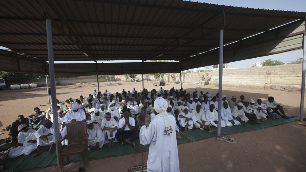 People attend Eid al-Firtr prayer in Khartoum, Sudan.