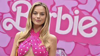 Barbie girl - Margot Robbie poses in pink at a photocall for the upcoming movie