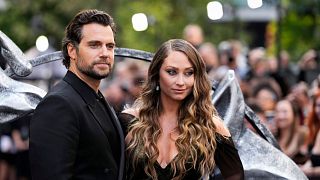 Henry Cavill, left, and Natalie Viscuso at the World premiere for the third season of 'The Witcher' in London