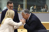 Hungary's Prime Minister Viktor Orban, right, speaks with Italy's Prime Minister Giorgia Meloni, center, and Poland's Prime Minister Mateusz Morawiecki,