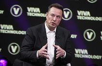 Elon Musk, who owns Twitter, Tesla and SpaceX, speaks at the VivaTech fair, June 16, 2023, in Paris. 