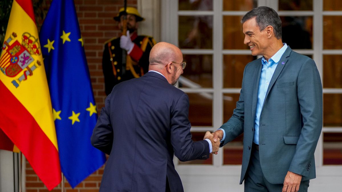 Spanish Prime Minister Pedro Sanchez, right, welcomes European Council President Charles Michel at the Moncloa Palace in Madrid, Spain, Sunday, July 2, 2023. 