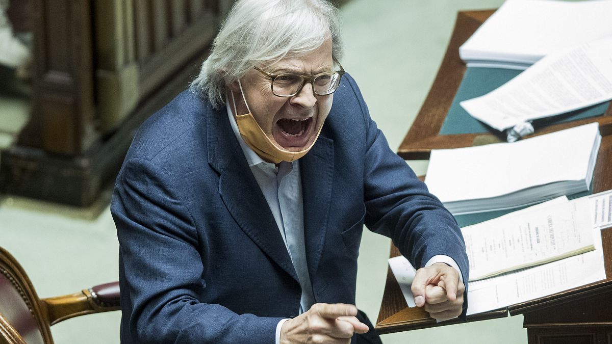 MP Vittorio Sgarbi shouts as he argues with other lawmakers during a debate on Justice in the parliament in Rome. Thursday, 25 June 2020. 