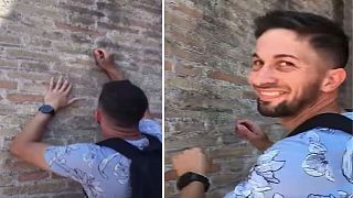 Ivan Dimitrov defacing the Colosseum