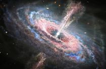 تصویرسازی از یک کهکشان دوردست با یک اختروش فعال در مرکز آن