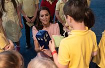 Kate, Princess of Wales, patron of the V&A, with children of Globe Primary school during a visit to open the Young V&A museum in Bethnal Green, London.