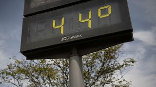 A street thermometer reading 44 degrees Celsius during a heatwave in Seville on July 12, 2022.