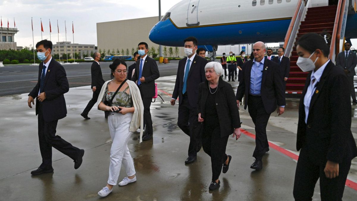 Treasury Secretary Janet Yellen, center, arrives at Beijing