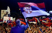 Bosnian Serb leader Milorad Dodik waves a Serbian flag at a protest in Banja Luka, the de facto capital of Republika Srpska.