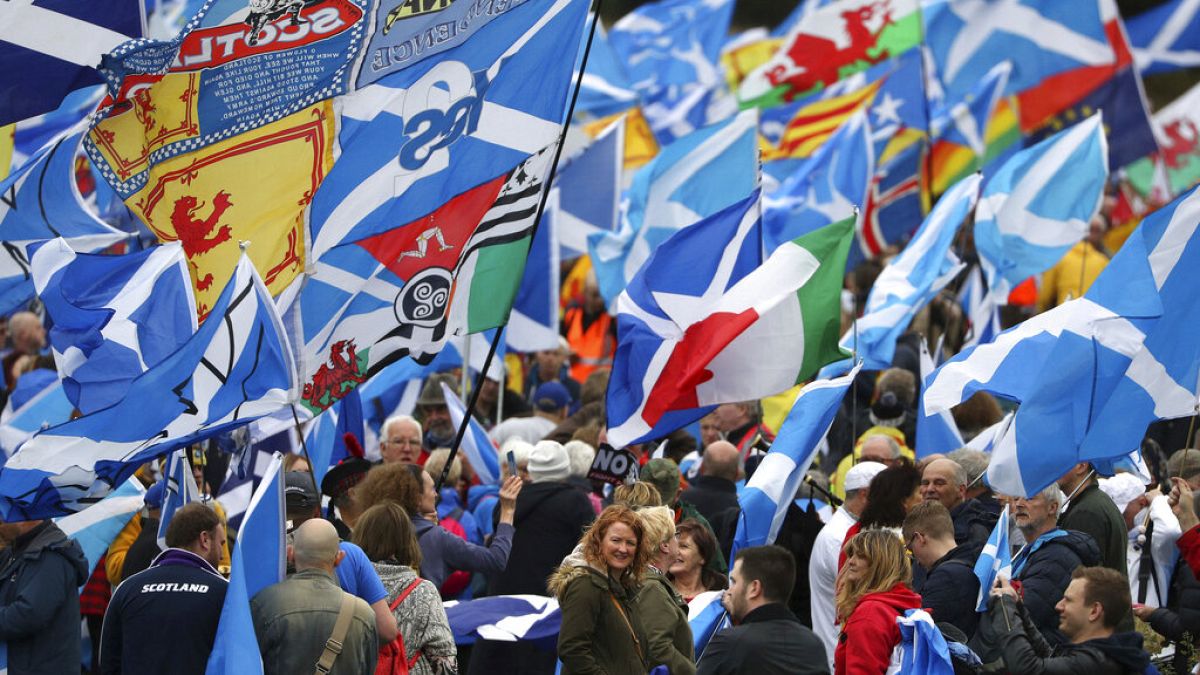 Scottish independence supporters march through Edinburgh, Scotland, Saturday Oct. 5, 2019. 