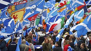 Scottish independence supporters march through Edinburgh, Scotland, Saturday Oct. 5, 2019. 