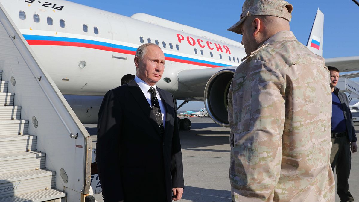 Путин и Пригожин в 2017 г. в Сирии