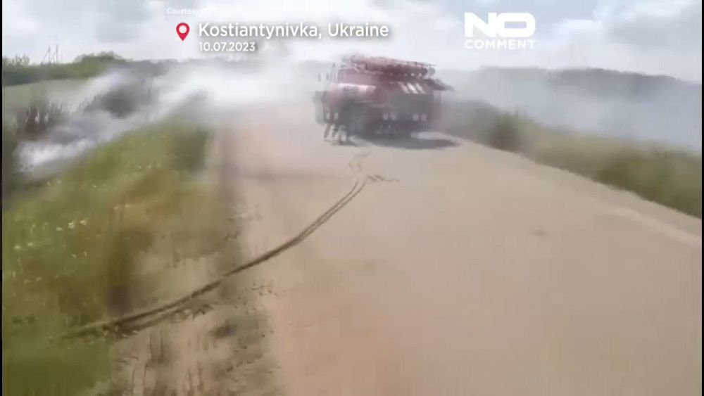 Watch: Ukrainian firefighters shelled while putting out blaze