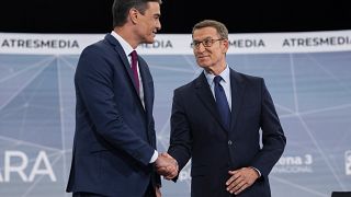 PP candidate, Feijóo, right, shakes hands with Spain's PM and Socialist candidate, Sánchez, prior to the televised live debate ahead of Spain's GE in Madrid.