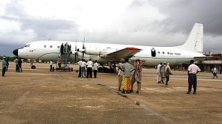 Small passenger plane veers off runway after landing at international airport in Somalia's capital