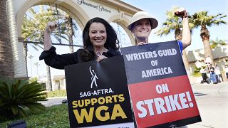 Fran Drescher, left, president of SAG-AFTRA, and Meredith Stiehm, president of Writers Guild of America West, pose together during a rally