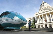 A full-scale mock-up of a high-speed train is displayed at the Capitol in Sacramento, California