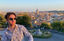 British-Italian journalist Andrea Carlo at the top of the Pincian Hill, overlooking Rome, 25 June 2023.