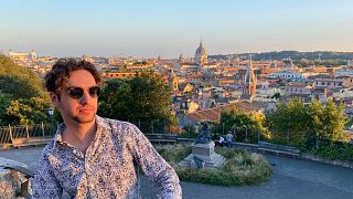 British-Italian journalist Andrea Carlo at the top of the Pincian Hill, overlooking Rome, 25 June 2023.