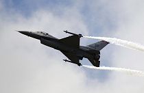 A Lockheed Martin F-16 Jet fighter performs its demonstration flight at the 49th Paris Air Show at Le Bourget airport, east of Paris.