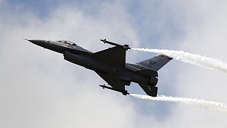 A Lockheed Martin F-16 Jet fighter performs its demonstration flight at the 49th Paris Air Show at Le Bourget airport, east of Paris.