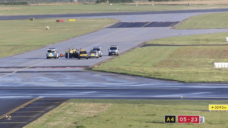 Germany: Climate Activists Glue Themselves To Runways, Causing Major ...