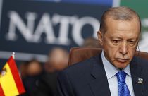 Turkish President Recep Tayyip Erdogan waits for the start of a round table meeting of the North Atlantic Council during a NATO summit in Vilnius, Tuesday, July 11, 2023.