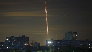 Russian rockets are launched against Ukraine from Russia's Belgorod region, seen from Kharkiv, Ukraine.