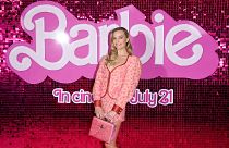 Margot Robbie wears a Vivienne Westwood ensemble at the Barbie movie's last press event in London