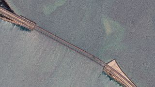Спутниковый снимок разрушений на Крымском мосту, 17 июля 2023 года.